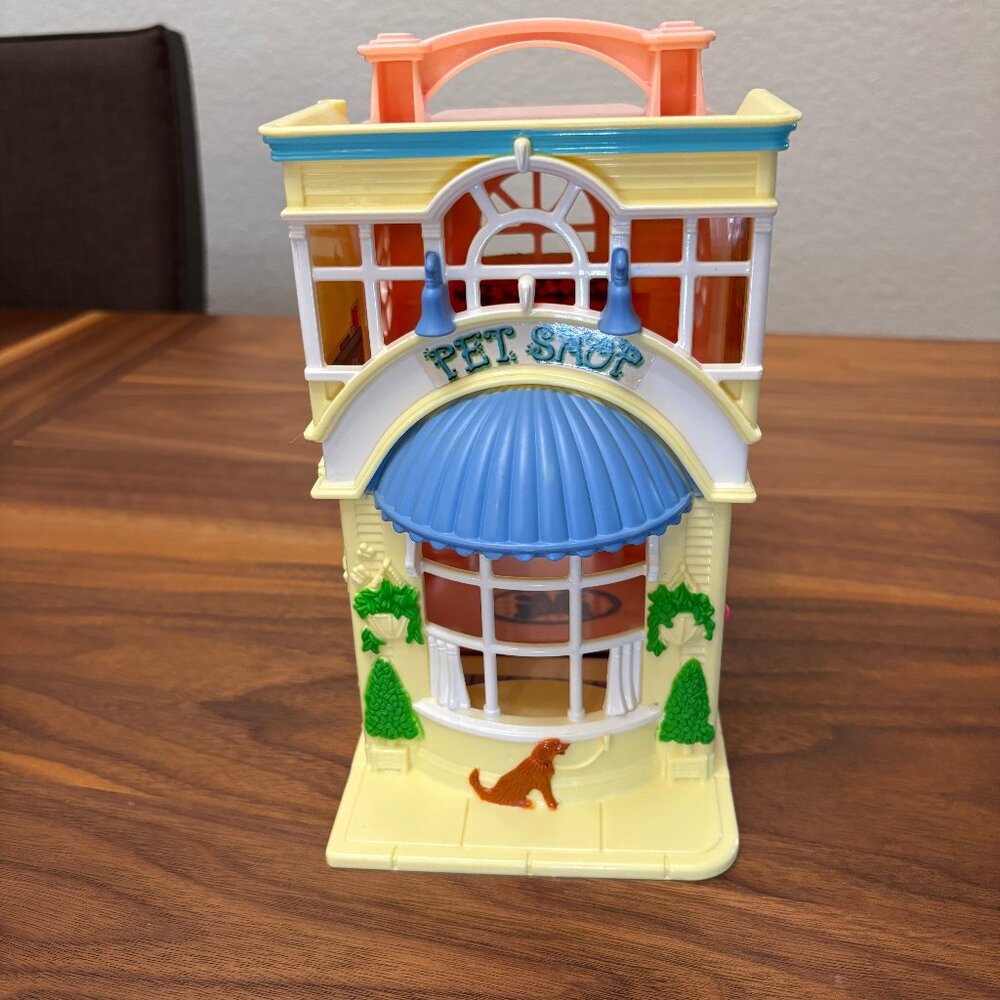 Pet Shop and Salon toy with doors that open, dogs, cats, and salon chair